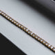Round Cut Tennis Bracelet in Yellow Gold